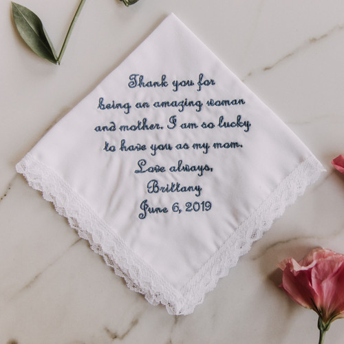 Handkerchief for mother of the bride with embroidered message and personalized name and wedding date.