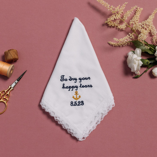 Happy tear white lace handkerchief with embroidered message, personalized date and anchor in gold.