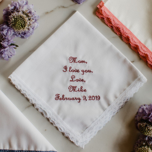 Embroidered wedding handkerchief for Mother of the Bride or Mother of the Groom with a simple I love you message that is personalized with your name and wedding date. Embroidery is shown in dusty rose thread.