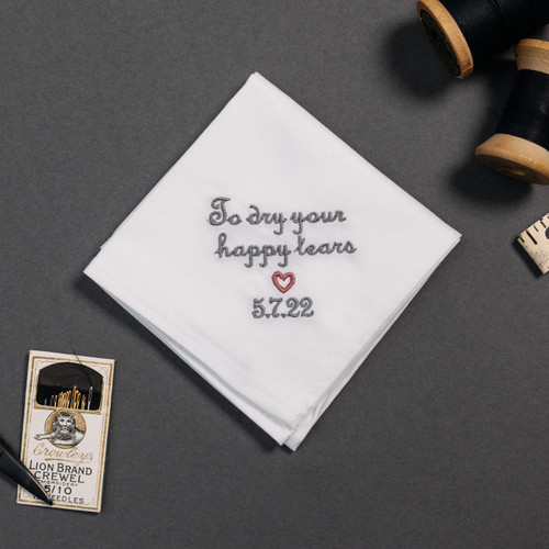 Happy tear white handkerchief with embroidered message, personalized date and heart in dusty rose thread.