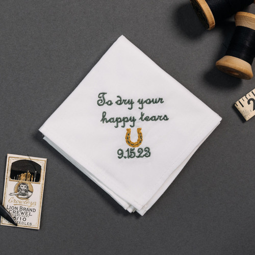 Happy tear white lace handkerchief with embroidered message, personalized date and horseshoe in gold.