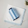 Something Blue handkerchief shown with perfect match embroidery thread in powder blue