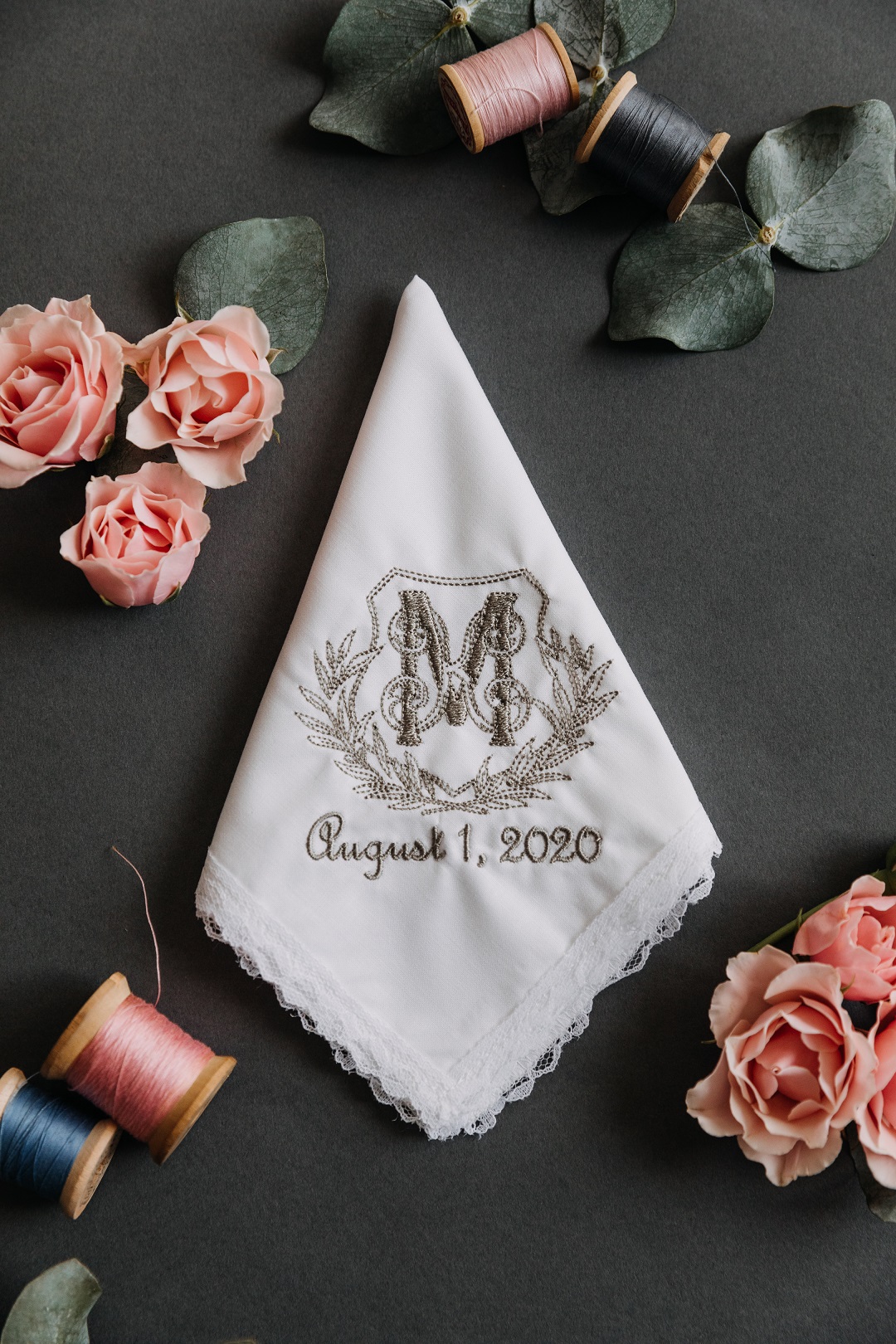 custom wedding handkerchief with monogram and date embroidered in taupe thread.