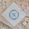 Something blue wedding handkerchief with monogram embroidered in powder blue.