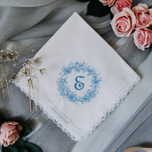 Something Blue wedding handkerchief embroidered with the bride's monogram & a floral wreath.