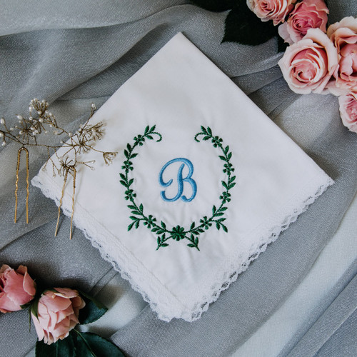 Something blue wedding handkerchief embroidered with bride's monogram and vines.